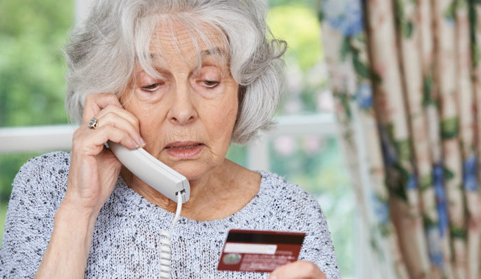 ELDERLY WOMAN PAYING FOR LONG TERM CARE OVER THE PHONE WITH CREDIT CARD