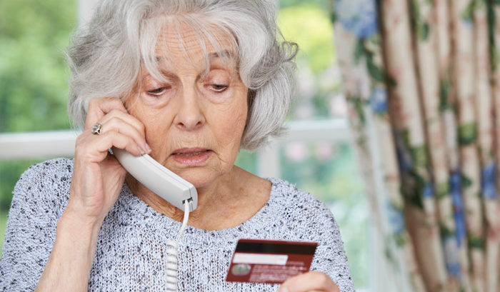 ELDERLY WOMAN PAYING FOR LONG TERM CARE OVER THE PHONE WITH CREDIT CARD